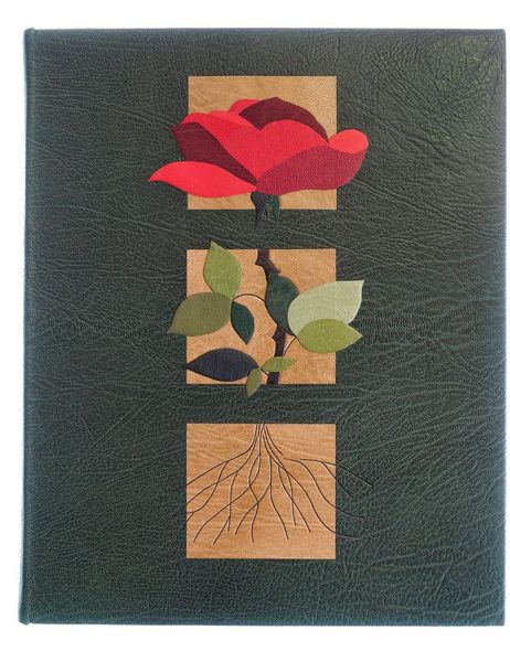 M. Maeterlinck. L'intelligence des fleurs. - Montage sur onglet. Plein oasis vert. Décor en mosaïque de cuirs sur les plats et décor au fer pour le racinaire, Garde en chevre velours.