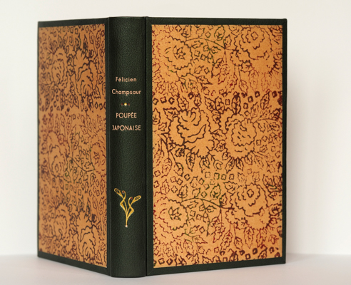 Félicien Champsaur, Poupée japonaise . - Bradel chagrin à encadrement.